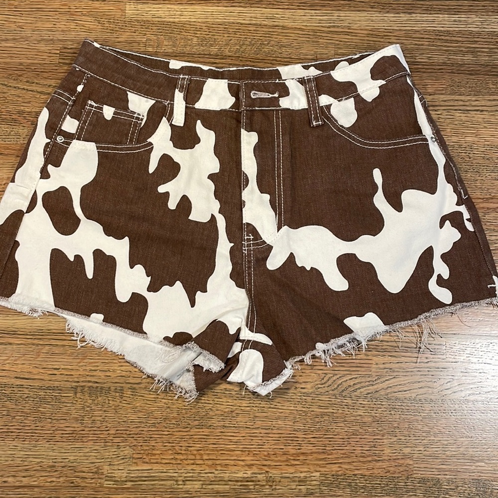 Cow print cutoffs